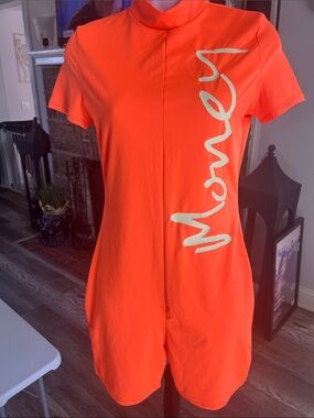 Fashion Nova Orange Short Sleeve Romper with Side Script